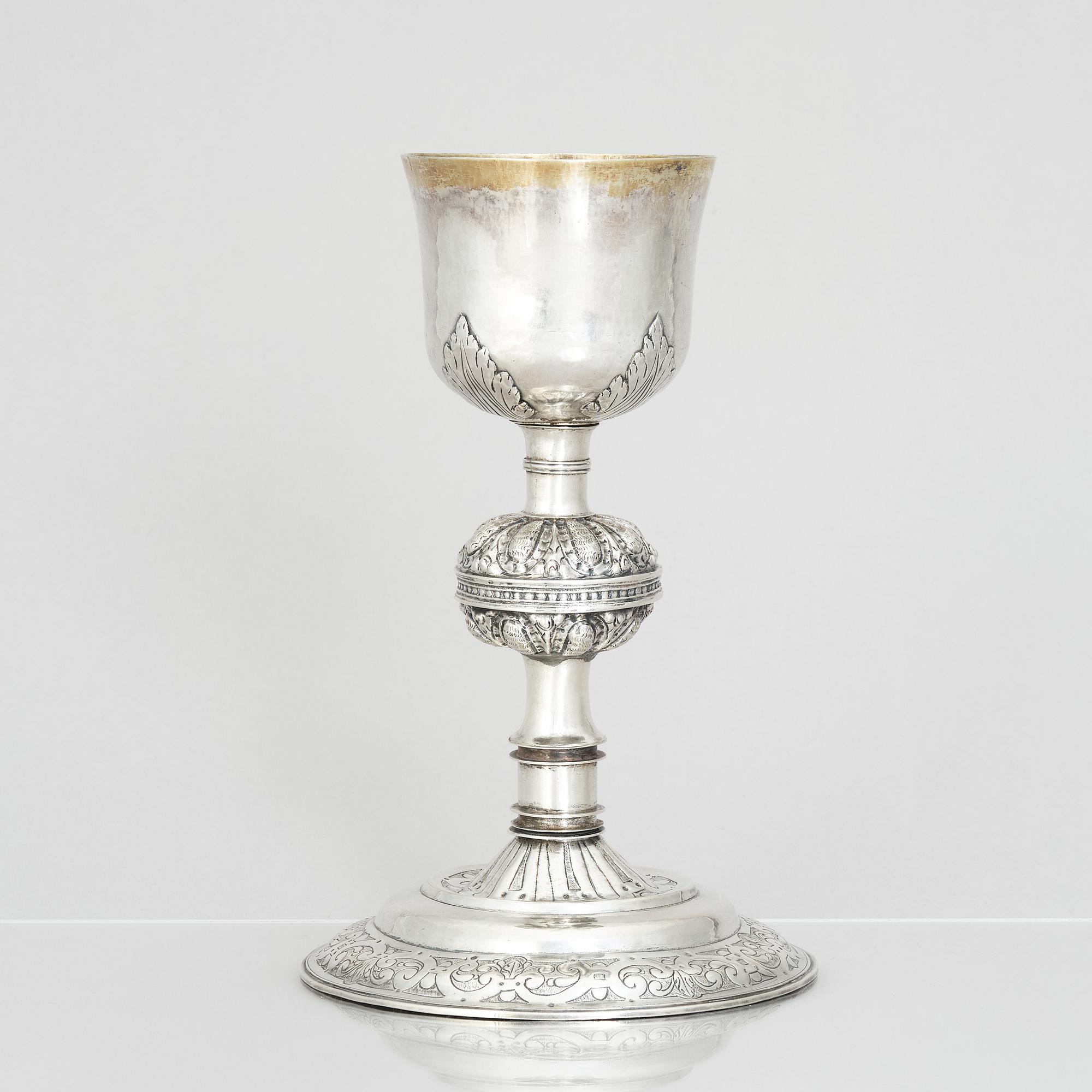 An 18th century parcel-gilt silver cup and paten, unmarked.