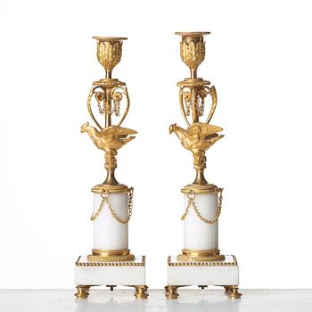 A pair of Louis XVI late 18th century candlesticks.