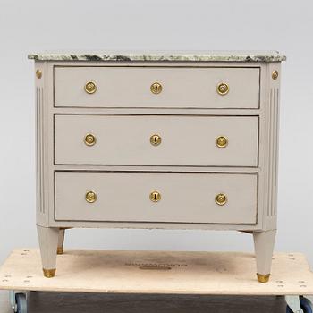 an early 20th century chest of drawers.