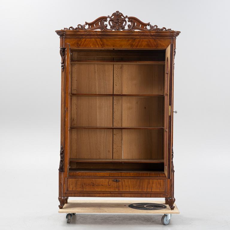 A mahogany veneered vitrine cabinet, mid 19t Century.