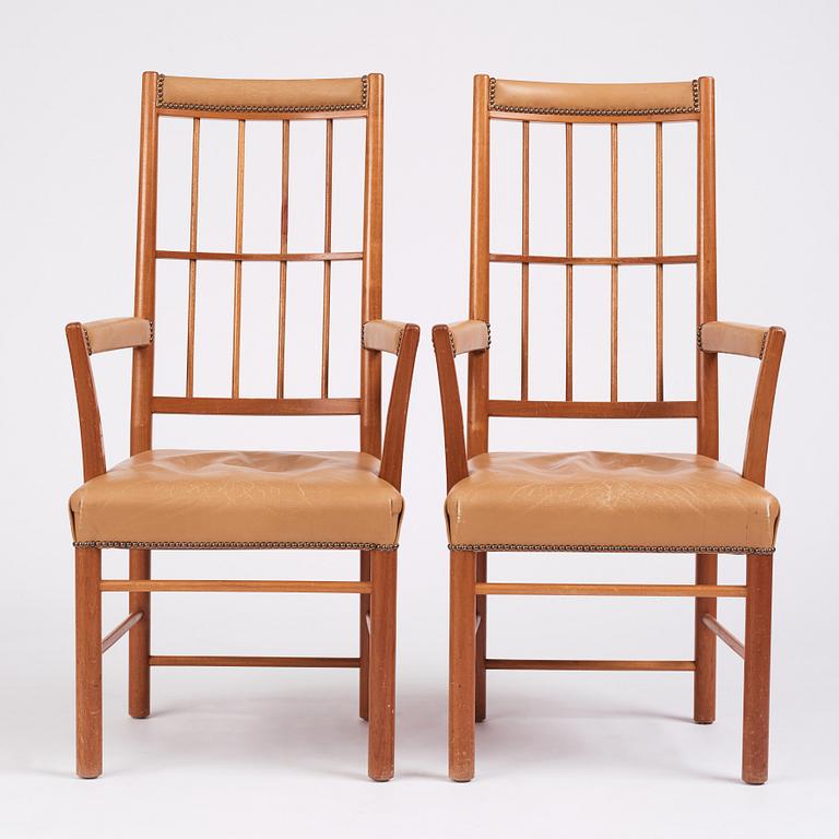 Josef Frank, a pair of mid-Century mahogany chairs, Svenskt Tenn Sweden, model nr 652.