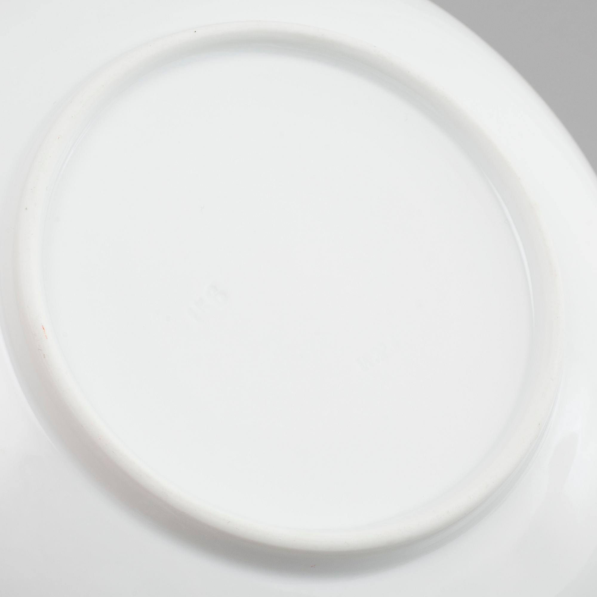 Eleven pieces of porcelain tabel ware, by Fischer and Mieg, second half of the 19th cenutry.