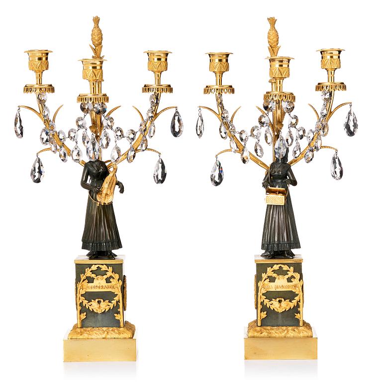A pair of French  circa 1820-30th´s Empire candelabra.