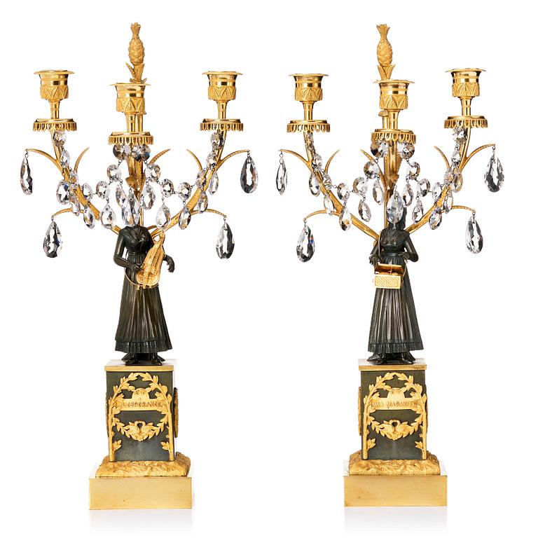 A pair of French  circa 1820-30th´s Empire candelabra.