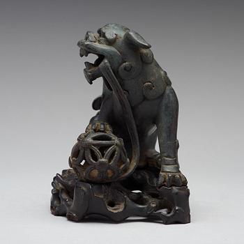 A bronze figure of a buddhist lion, Qing dynasty, 19th Century.