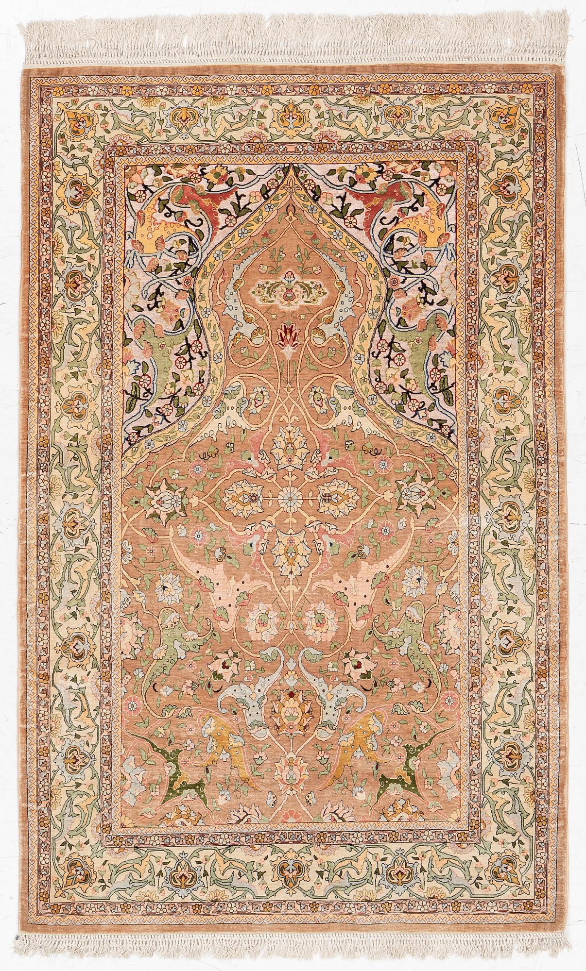 A semi-antique Hereke souf, silk and metal thread rug, West Anatolia, c. 163 x 103 cm.