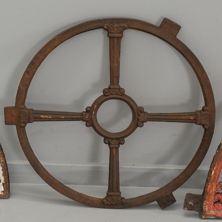 A SET OF THREE CAST IRON WINDOWS.