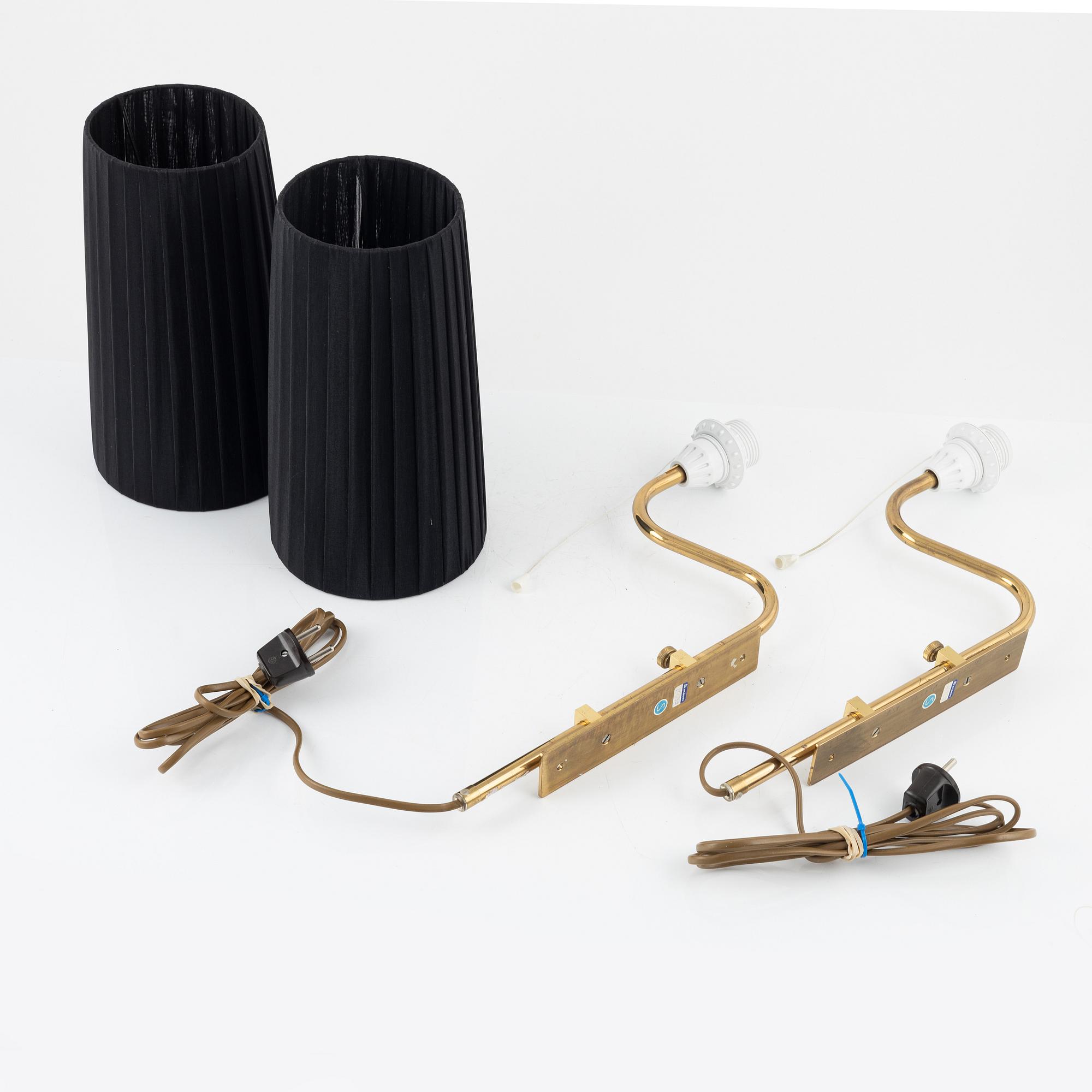 A pair of brass wall lights from Bergboms, second half of the 20th Century. Marked.