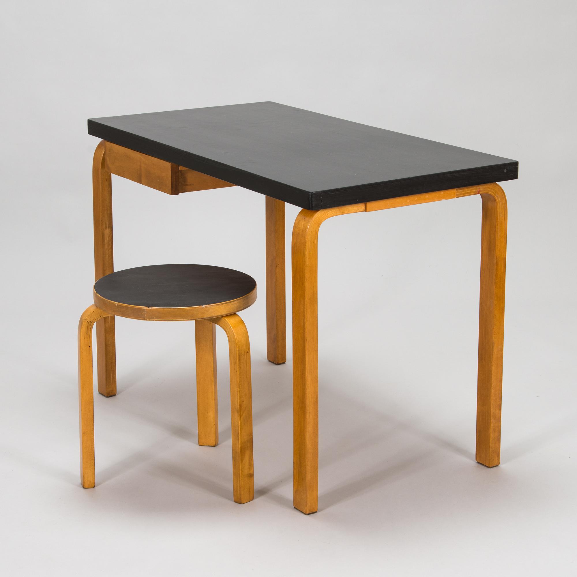 Alvar Aalto, amid 20th century 'K81' desk and '60' stool for O.Y. Huonekalu-ja Rakennustyötehdas A.B.