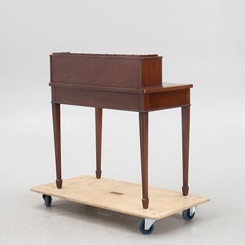 An English mahogany-veneered desk, late 20th century.