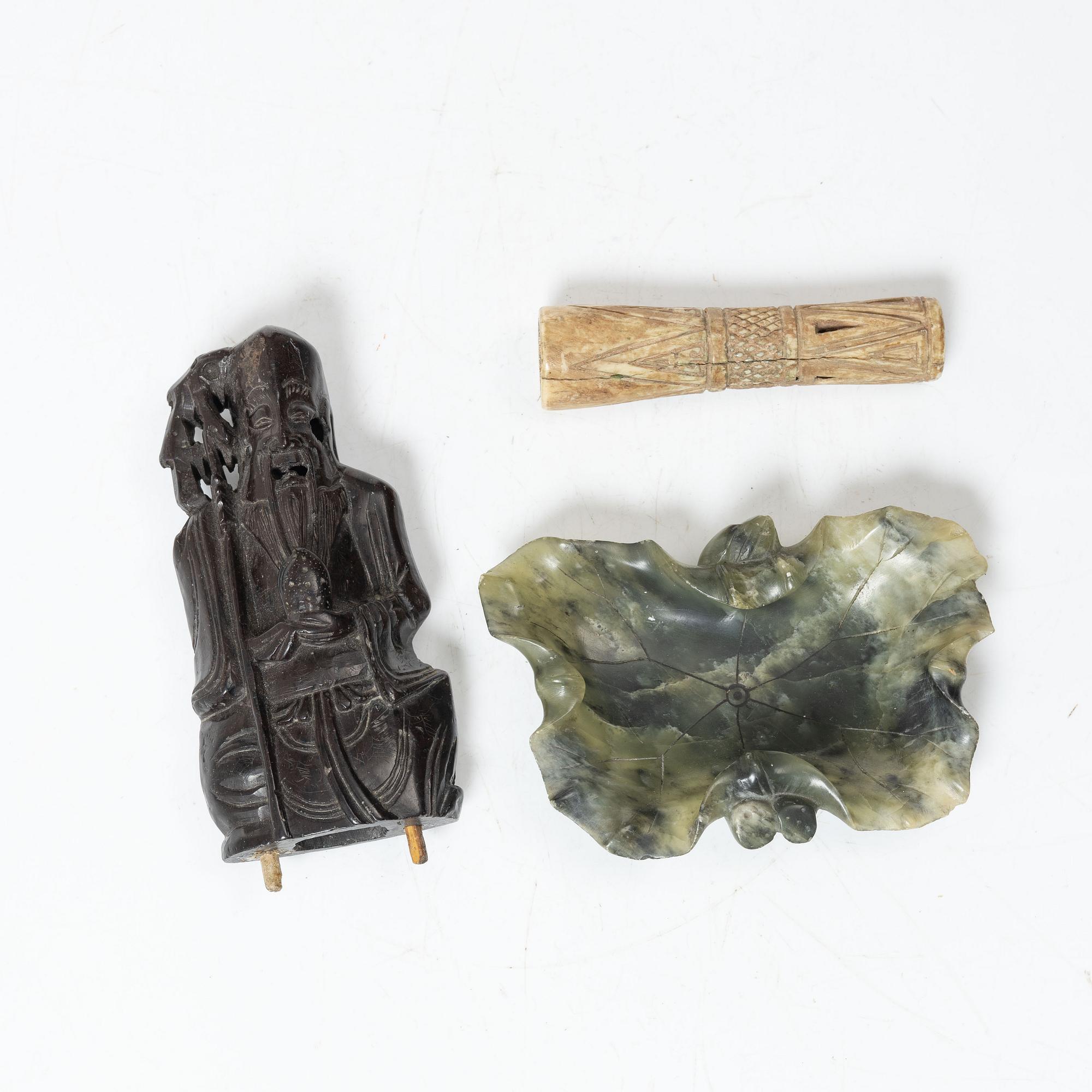 A Chinese green stone brush washer, a carved bone and a soapstone figure, partly Qing dynasty.