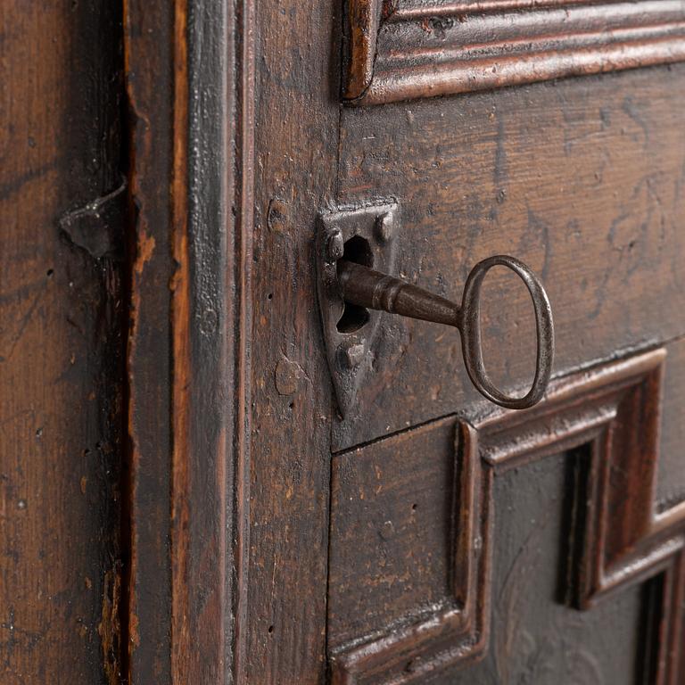 A Swedish provincial wall-hanged corner cabinet, dated 1790.