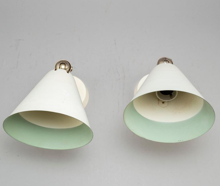 A pair of Asea wall lamps.