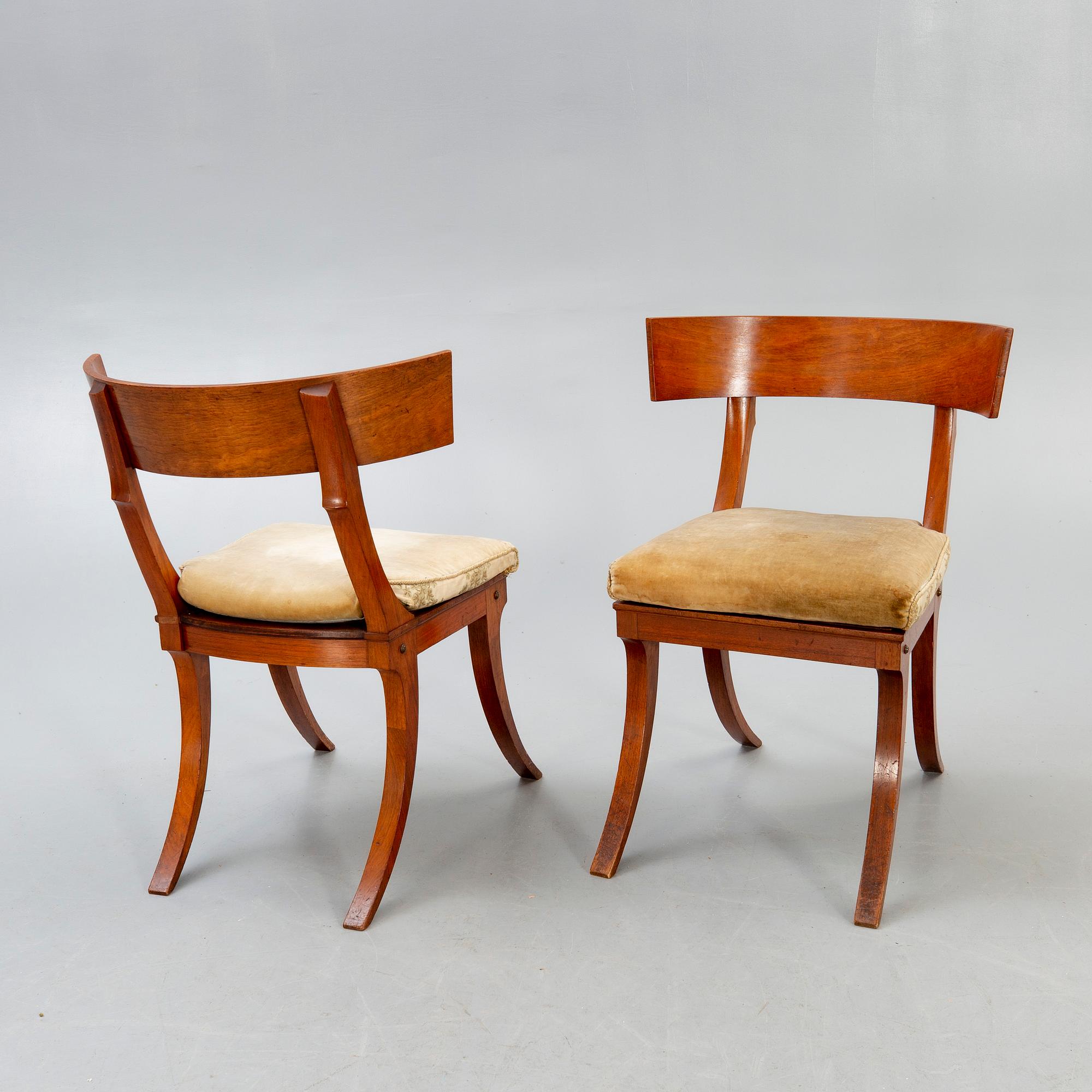 A set of four mahogany chairs around 1900.