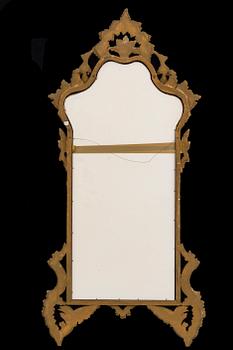 An mid 20th century Louis XV-style mirror from Paoletti, Firenze Italy.