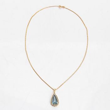 Amsterdam Sauer,an 18K gold pendant with a topaz and diamonds, chain in 14K gold, Unoaerre, Italy.