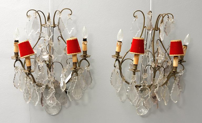 VÄGGLAMPETTER, ett par, rokokostil, 1800-tal.