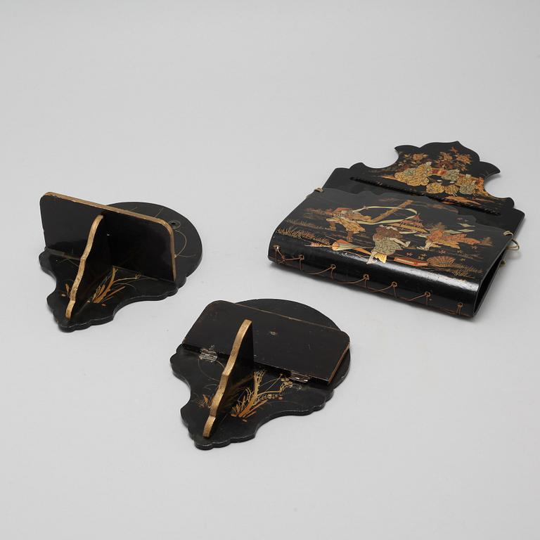 Two Japanese lacquered wall brackets and a letter box, early 20th Century.