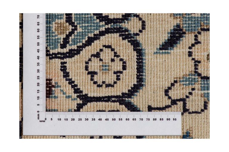 An old part silk Nain carpet ca 187 x 116 cm.