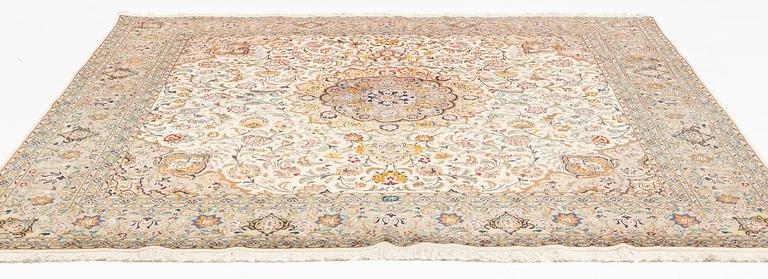 A Carpet, Tabriz, part silk, 248 x 248 cm.