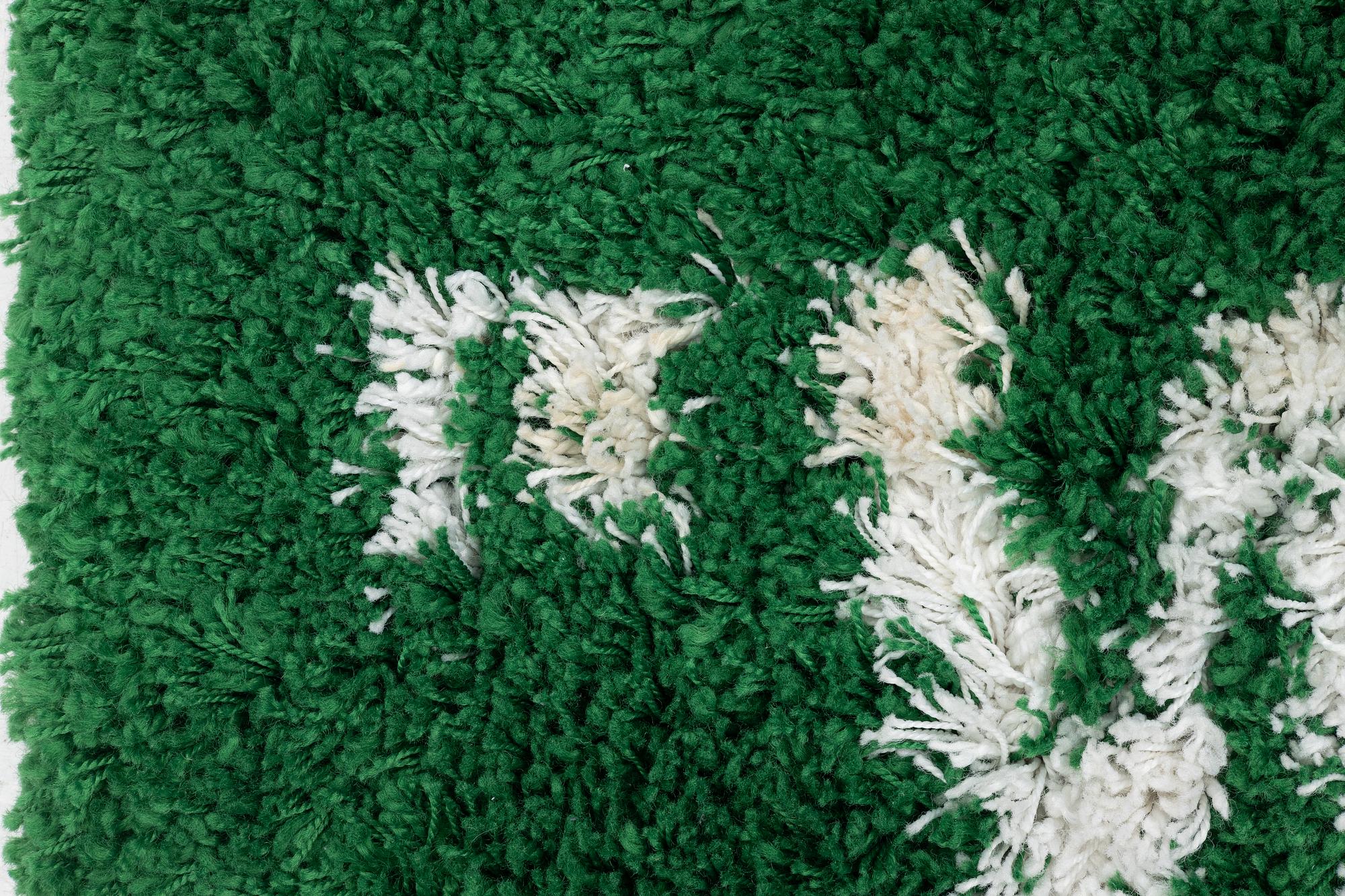 a "Wet Grass" carpet, Ikea, ca 199 x 136 cm.