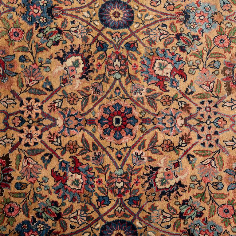 Semi-antique Tabriz rug, approximately 368x254 cm.