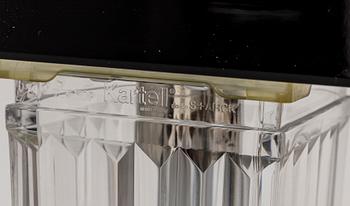 A "Tip Top" dining table by Philippe Starck for Kartell.