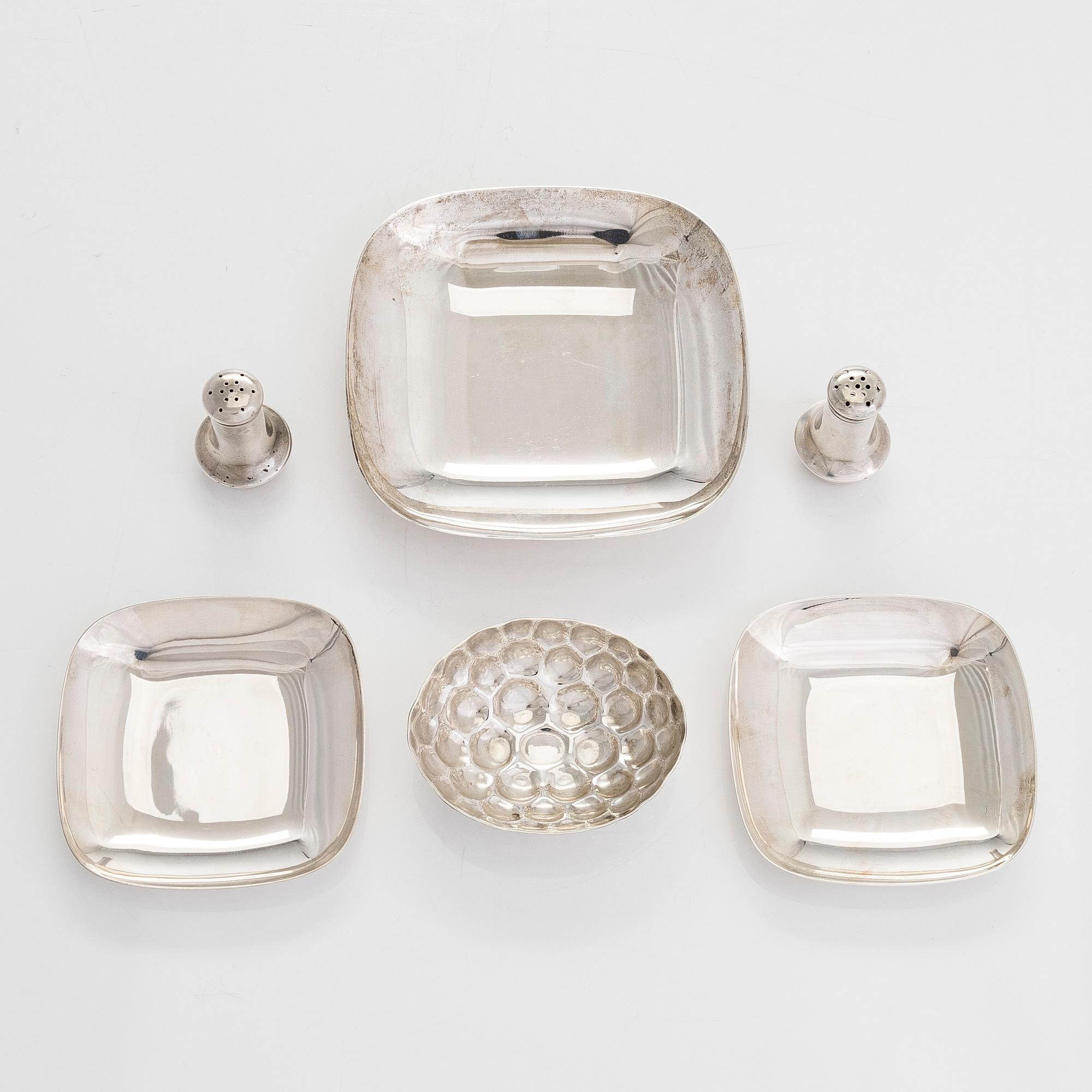 Tiffany & Co MAKERS, a four piece set of sterling silver bowls, salt and pepper shakers by other maker.