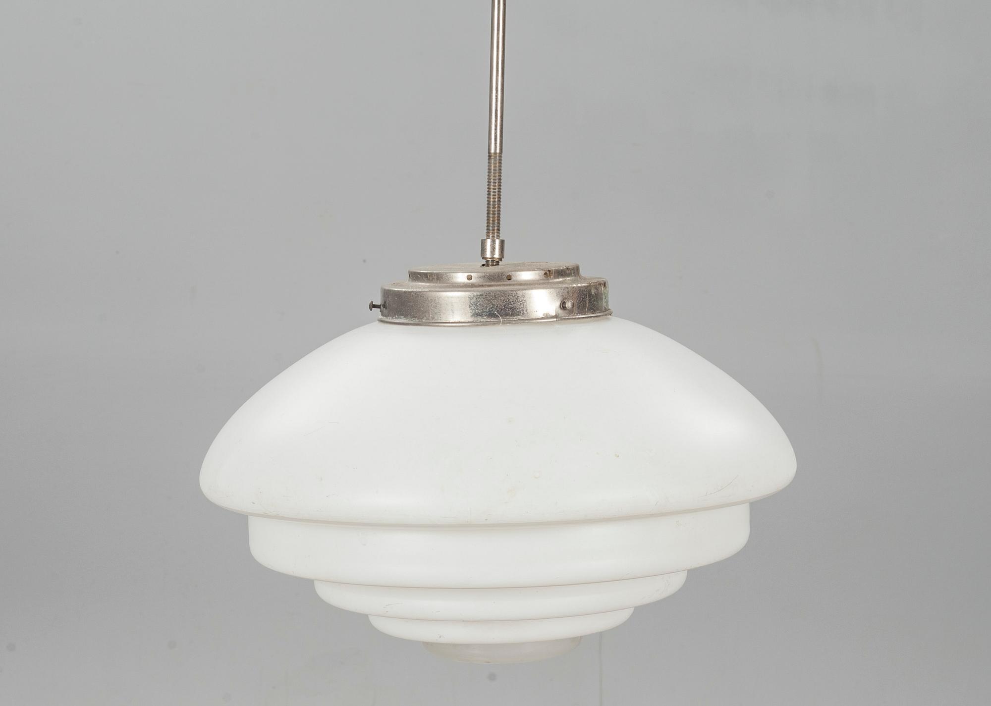 TAKARMATURER, ett par. Funkis, 1900-talets första hälft.