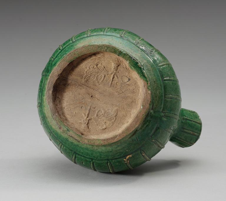 A green glazed kendi, Ming dynasty.