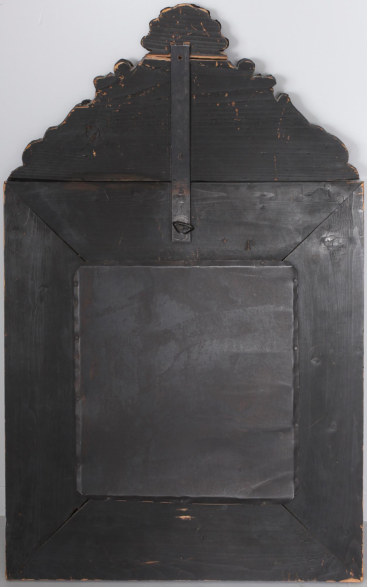 A baroque style mirror, late 19th century.