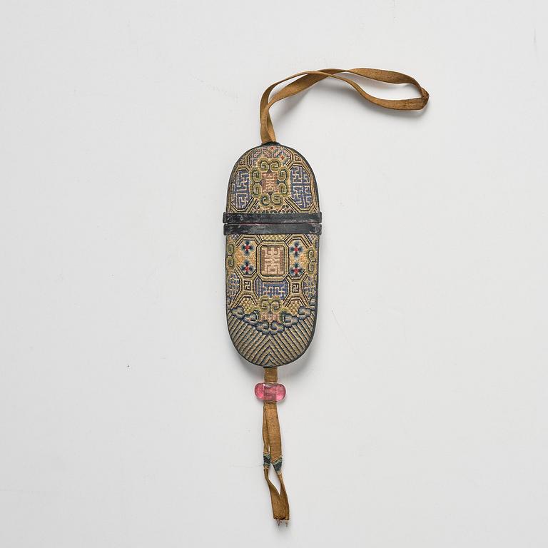A set of three embroidered purses/ eye-glass cases, Qing dynasty, 19th century.