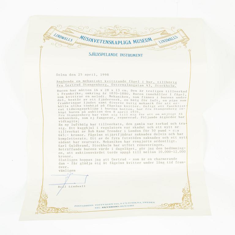 A music box in the shape of a bird's cage, France, late 19th century.