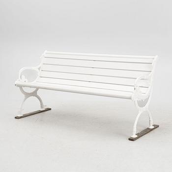 A cast iron garden bench, 20th century.