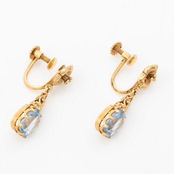 Earrings, 18K gold with synthetic blue spinels.