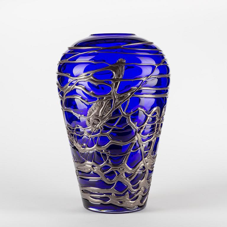 A blue and iridescent glass vase, Bohemian Art Glass, Czech Republic, indistingtly signed.