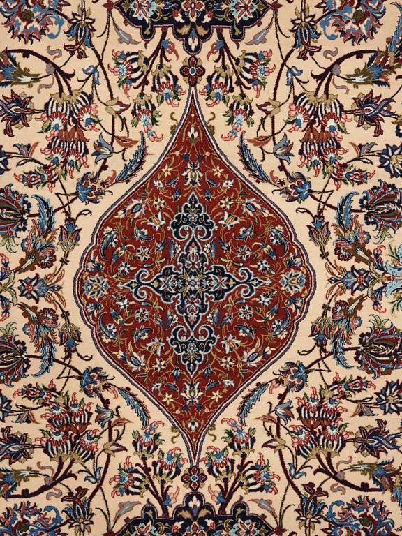 A CARPET. An old Esfahan Nazeri nedjad. 240,5 x 157,5 cm (as well as one end with one cm flat weave,