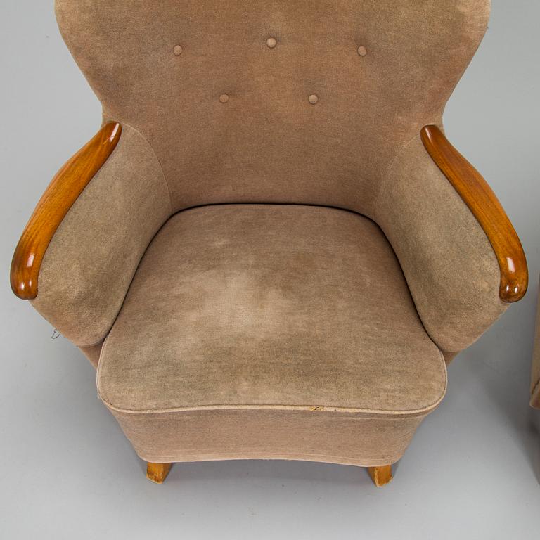 A pair of 1950's armchairs.