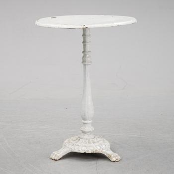 A cast iron garden table, early 20th century.