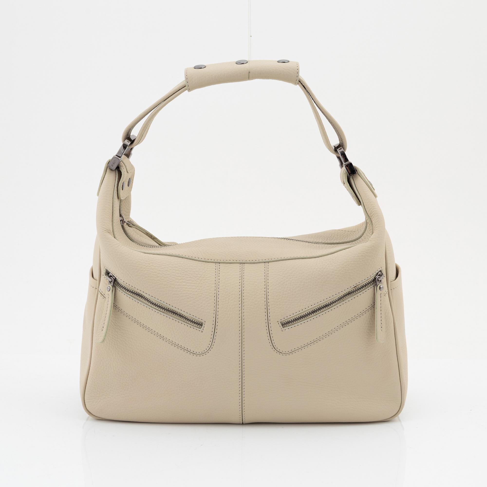 Tod's, a beige leather bag.