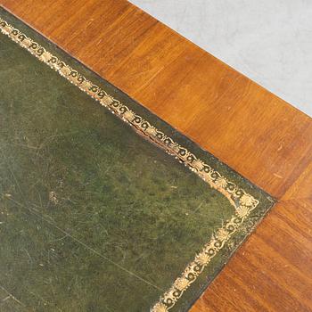 An mahogany veneered Empire style library table by Lorentz Wilhelm Lundelius Stockholm 1818-1857.