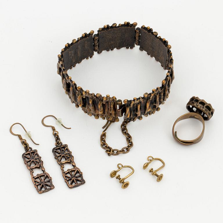 A bronze bracelet, ring and a pair of earrings by Pentti Sarpaneva, Finland.