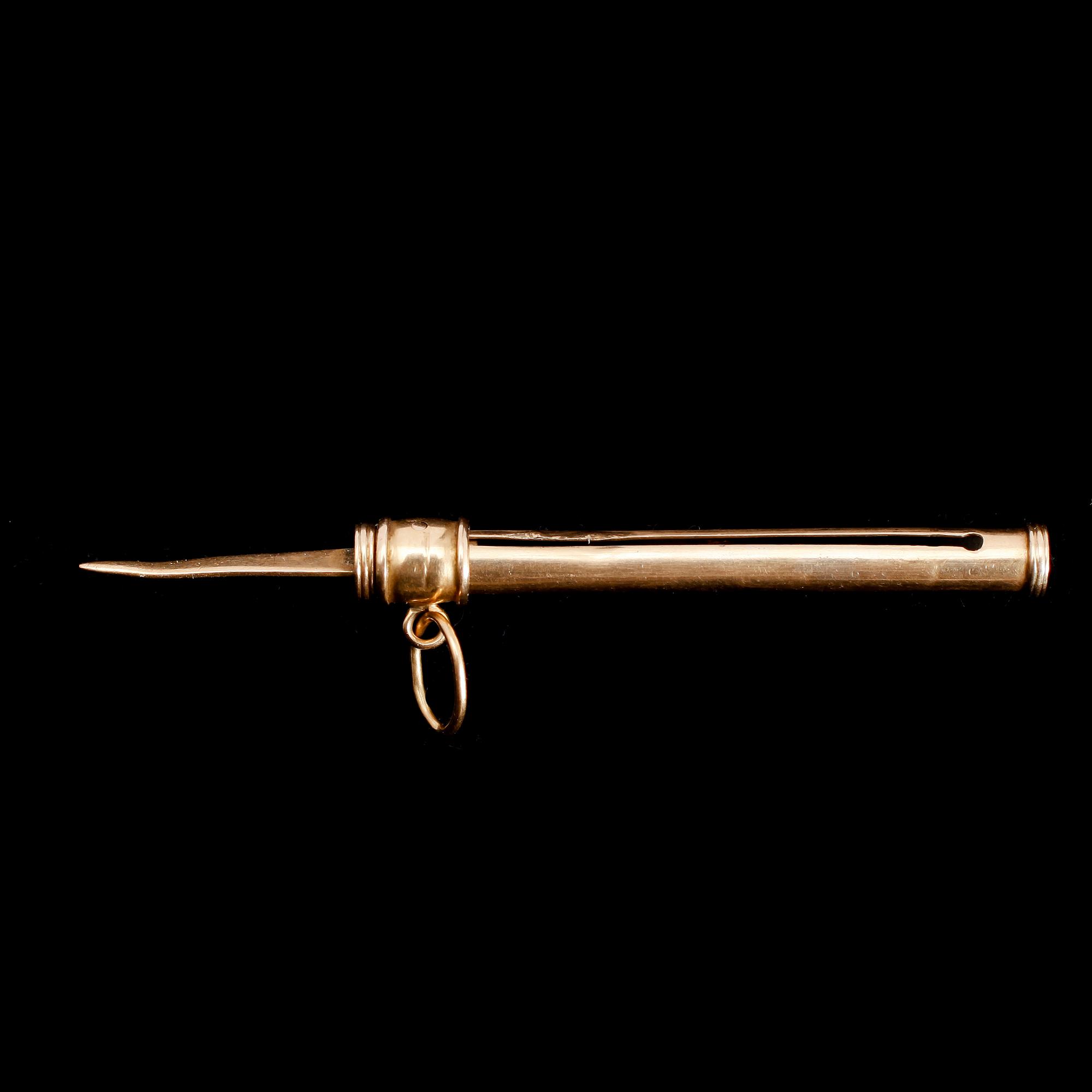 TANDPETARE, guld. Vikt 4 gram.