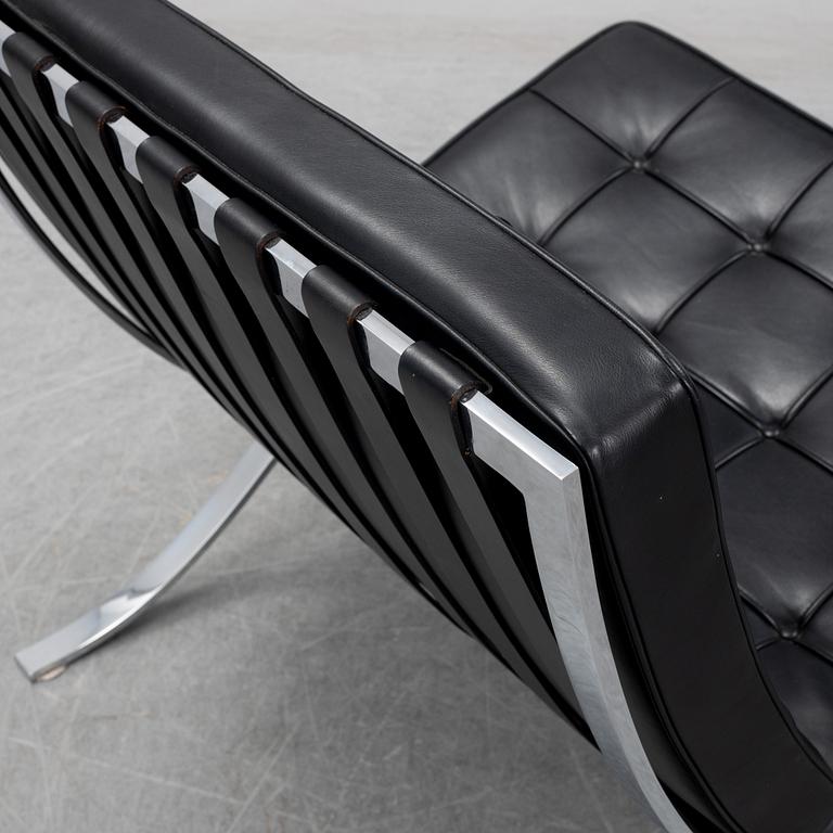 LUDWIG MIES VAN DER ROHE, a 'Barcelona' black leather lounge chair, Knoll Studio.