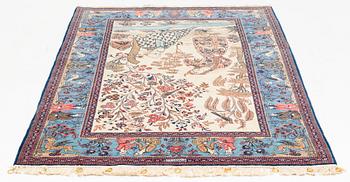 A signed Kashan 'Dabir' carpet, ca 206 x 136 cm.