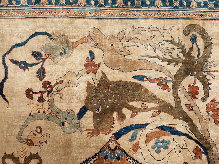 A RUG. An antique silk Heriz. 177 x 146 cm.