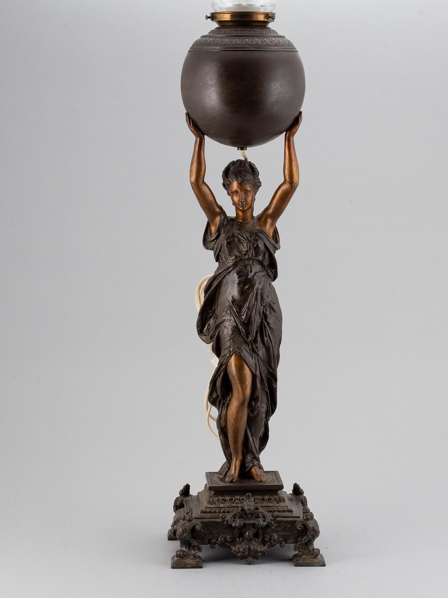 A spelter table light, circa 1900.