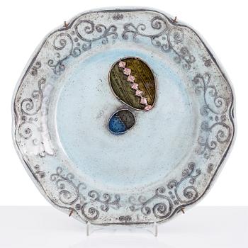 RUT BRYK, a faience plate signed BRYK.