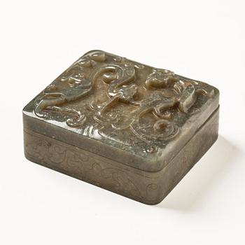 A well carved green stone box with cover, China, 20th century.
