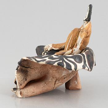Ulrica Hydman-Vallien, a stoneware sculpture of a seated woman, executed in her own workshop, Sweden.